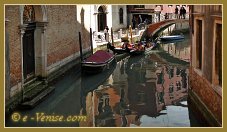 Reflets sur le rio de San Zulian, au fond, le pont de la Guerra, frontière entre les Sestieri du Castello (à gauche) et de Saint Marc à Venise.