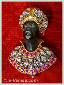 Sigfrido Cipolato Orfèvre à Venise, broche tête de négre en or, ébène et sertie de diamants Sigfrido Cipolato Orfèvre à Venise, broche tête de négre en or, ébène et sertie de diamants